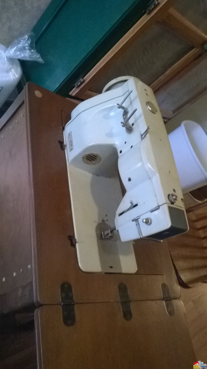 Image for Re: I need help finding out the manufacturer of my grandmothers sewing machine. 
